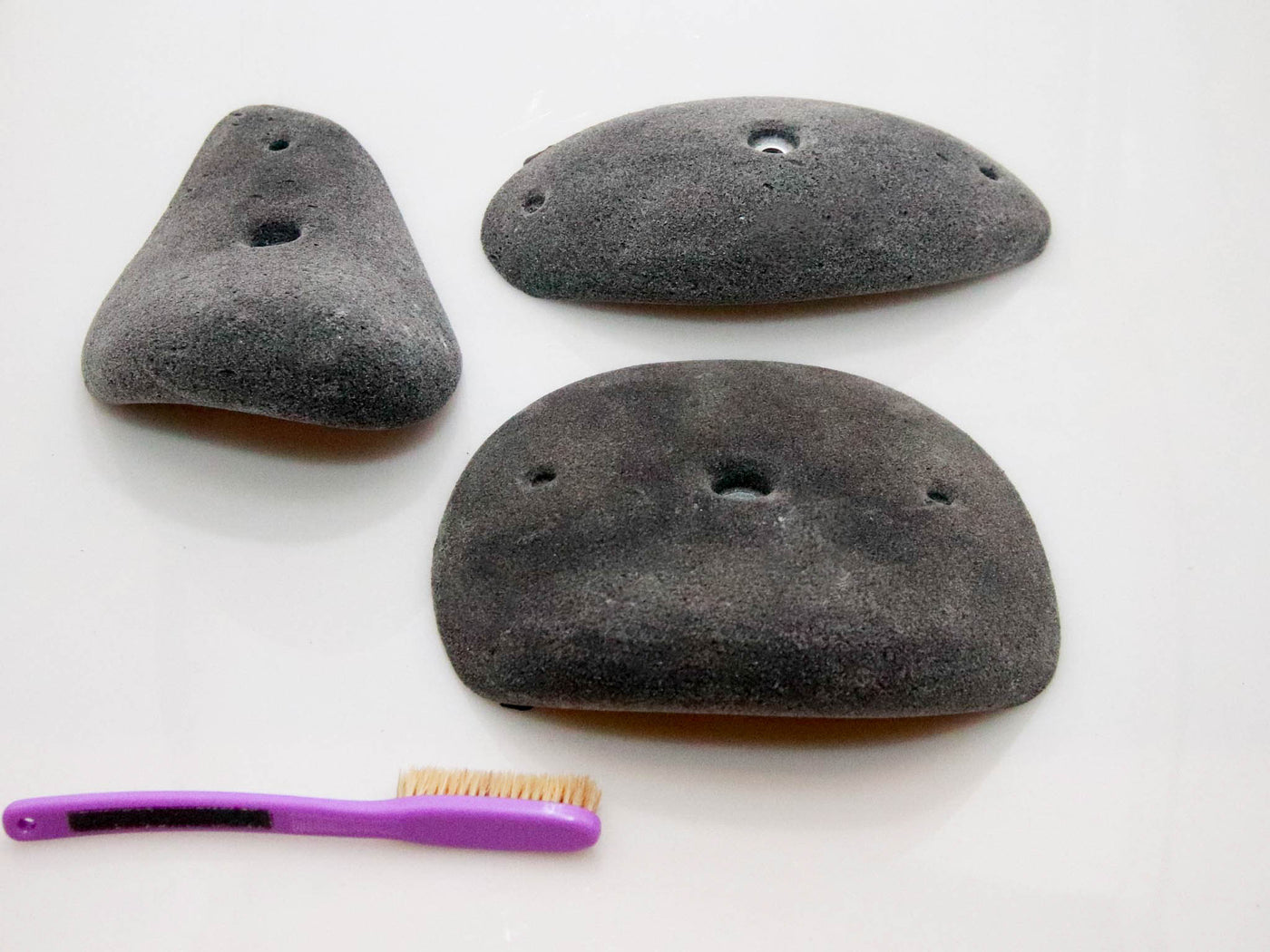 Rhino Holds Tubular Jugs